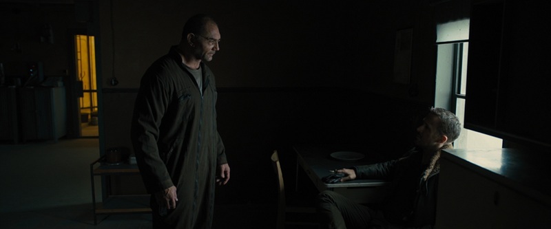 Sapper Morton facing K in Blade Runner 2049