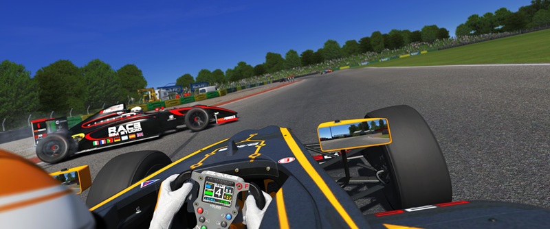 A driver spins ahead of me